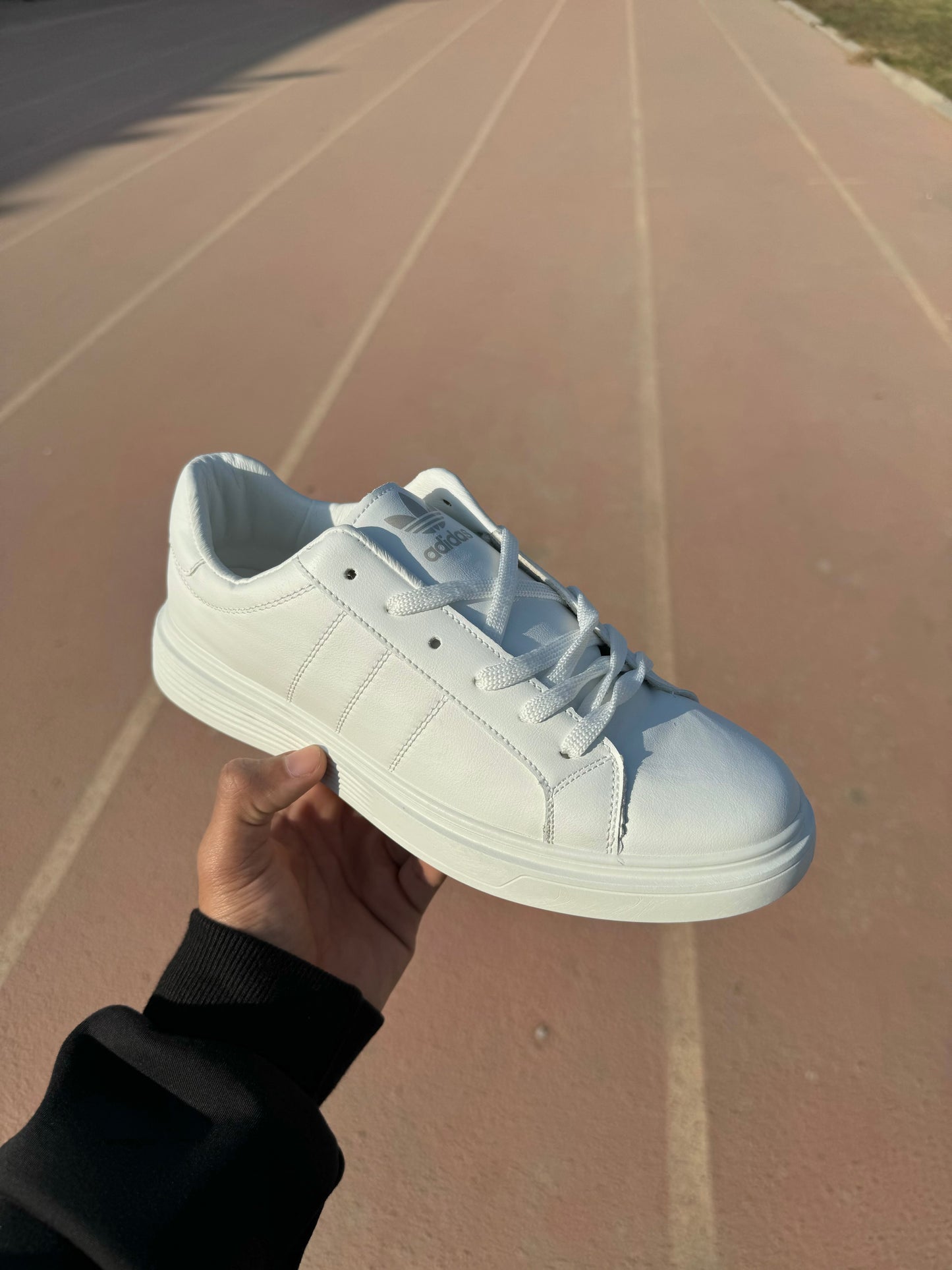 White adidas flat shoes