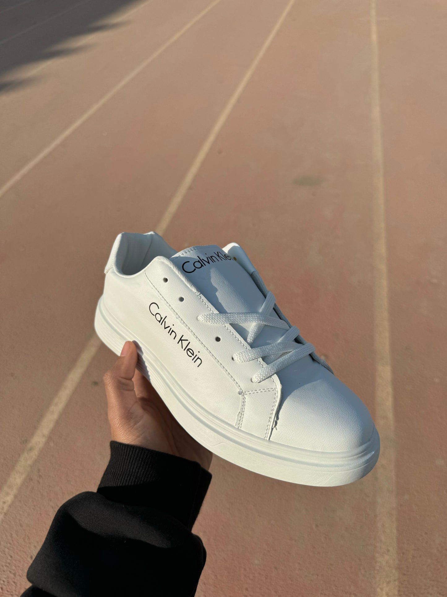 White flat shoes Calvin Klein