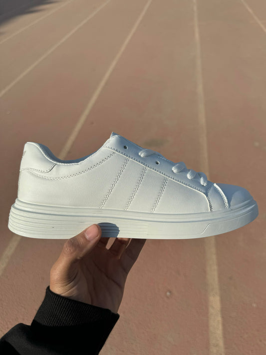 White adidas flat shoes